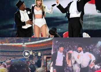 Video: He’s her No1 fan! Taylor Swift’s Superbowl-winning fella Travis Kelce PERFORMS on stage with her at Wembley – carrying her across the stage then fanning her to the delight of the crowd